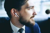stupid looking earpiece - similar to an airpod or perhaps actually apple's airpod