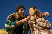 Two people smoking a joint