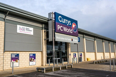 empty parking lot in front of Dixons Carphone shop on industrial estate.
