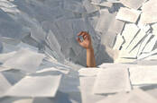 Someone drowning in paperwork