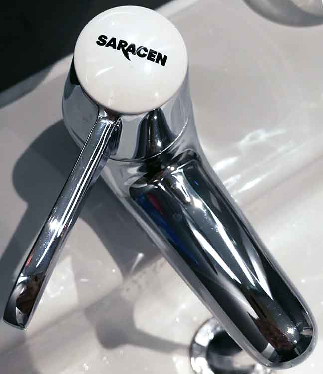 Hotel bathroom tap with Saracen brand