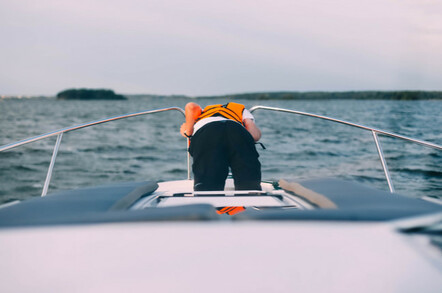 Man sick on a yacht at sea