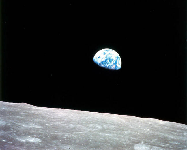 Taken aboard Apollo 8 by Bill Anders, this iconic picture shows Earth peeking out from beyond the lunar surface as the first crewed spacecraft circumnavigated the Moon. Image Credit: NASA