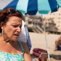 woman notices roaming charges on her european holiday