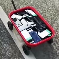 Simon Weckert's cartful of Google Maps-baffling phones