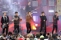 One Direction on 'Good Morning America' in Central Park on November 26, 2013 in New York City