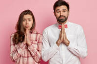 Two people, man and woman, pleading