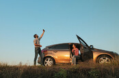 Man and woman struggling to get signal