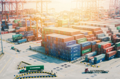 shipping containers in a port in Shenzhen, China – early morning