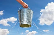 A bucket leaking water