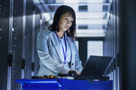 Someone working in a server room