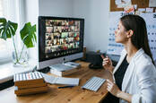 Someone holding a Zoom conference video call