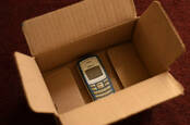 A Nokia feature phone in a cardboard box