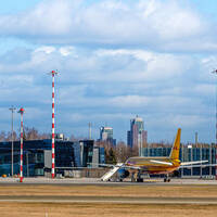 Riga, Latvia - March 19, 2020  a courier plane lands at a partially closed Riga International Airport