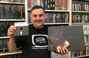 Jason Fitzpatrick with the Limted Edition backers edition of Elite Dangerous and an original 5.25" Floppy disk from the early '80s