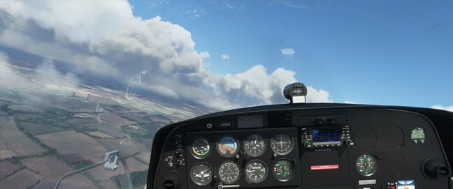 A spot of low-level Visual Flight Rules over Bedfordshire in Microsoft Flight Simulator 2020. Note the instruments' reflection on the cockpit canopy