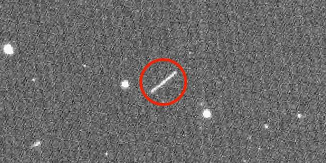 The circled streak in the center of this image is asteroid 2020 QG, which came closer to Earth than any other nonimpacting asteroid on record. It was detected by the Zwicky Transient Facility on Sunday, Aug. 16 at 12:08 a.m. EDT (Saturday, Aug. 15 at 9:08 p.m. PDT). Credits: ZTF/Caltech Optical Observatories