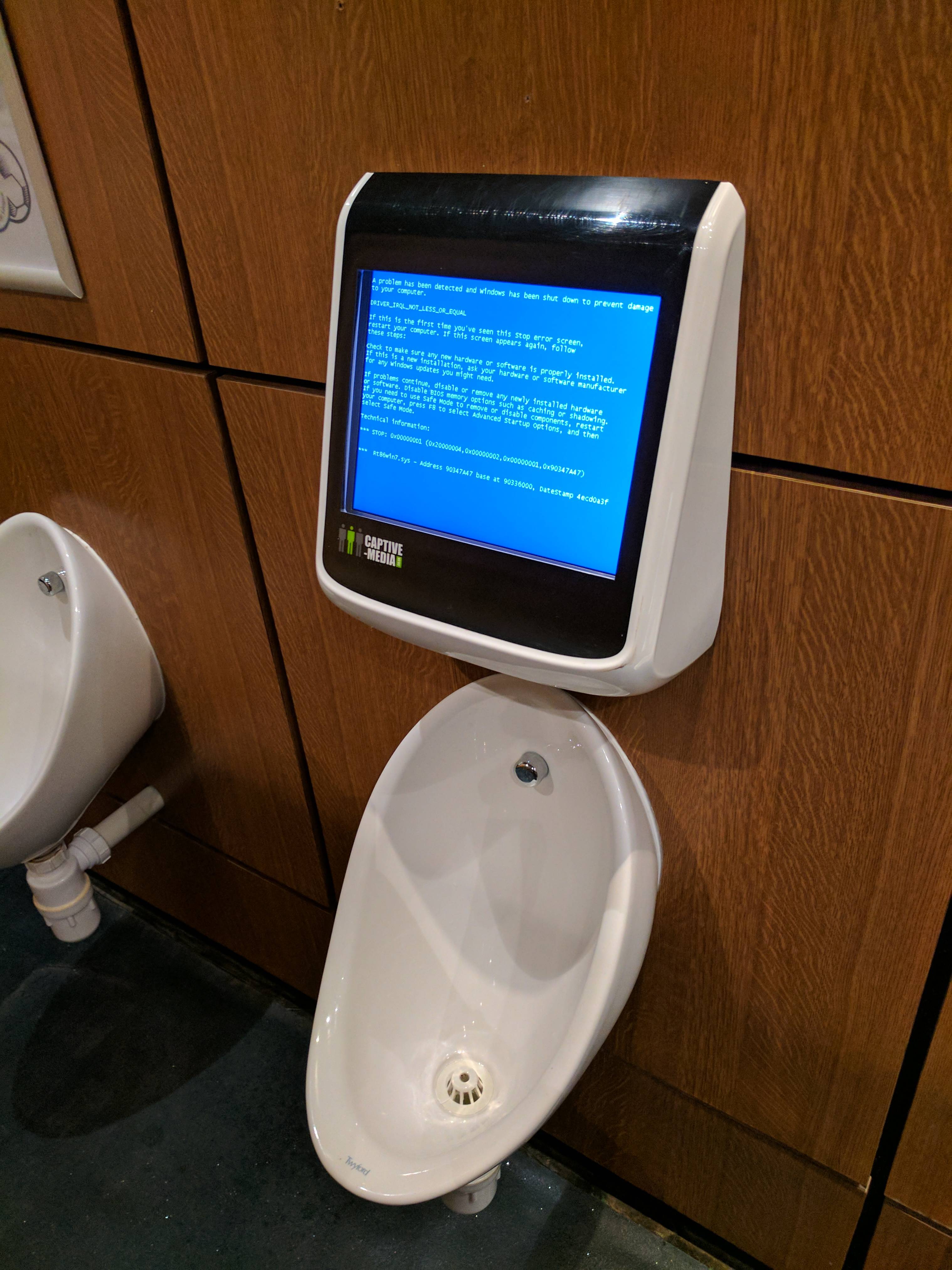 photo of Behold the Bloo Screen of Death: Bathroom borkage stops <s>spray</s> play image