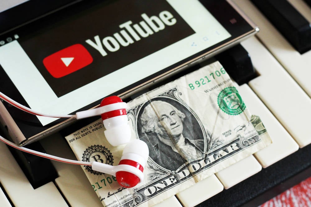 Two charged with falsely claiming rights to YouTube songs