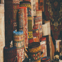 Stack of rolled up carpets in authentic shop in Istanbul, Turkey