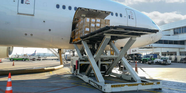cargo loading with high loader at airport