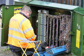 Chorleywood, Hertfordshire, England, UK - March 7th 2020: BT Openreach engineer working at cabinet box. Openreach is a functional division of the telecommunications company BT plc.