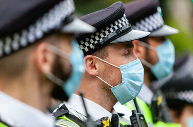 British police officers in coronavirus masks