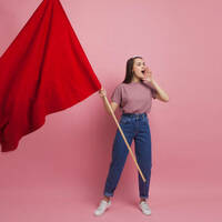 Someone waving a red flag as a warning