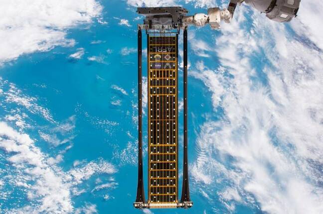 NASA Image: ISS052E002871 - The Roll-Out Solar Array (ROSA) is an innovative prototype of a solar panel that rolls open in space like a tape measure and is more compact than current rigid panel designs.