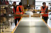 Workers in an Amazon warehouse