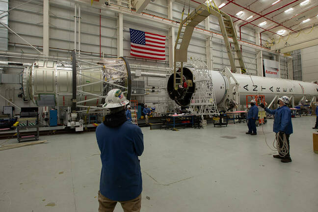 Northrop Grumman staff prepare to mate the company’s Cygnus spacecraft with its Antares rocket in the Horizontal Integration Facility at NASA’s Wallops Flight Facility in Virginia Monday, Feb. 8, 2021