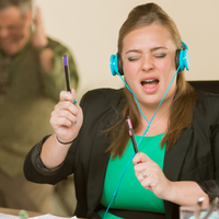 Woman singing loudly at work