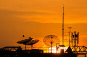 C-band satellite dish on a roof.