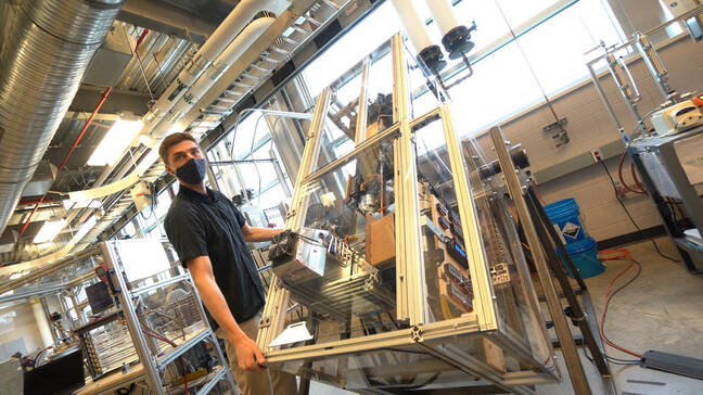  Brendel rotates a highly instrumented fridge experiment designed to work in different orientations - even upside down