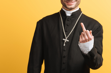 Priest showing middle finger