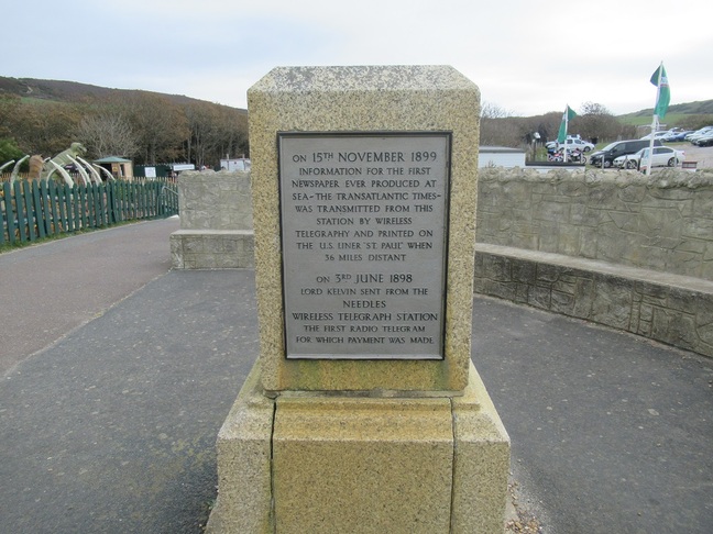 Alum Bay - Marconi memorial with dinosaur in background © SA Mathieson