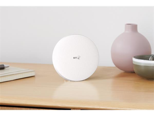 A BT Mini Whole Home Wi-Fi Disc range extender