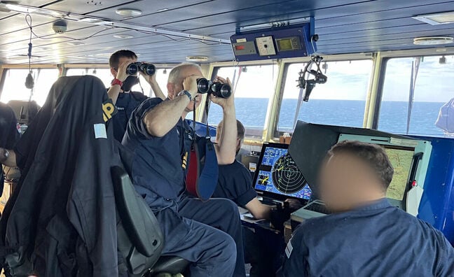 HMS Severn's bridge crew at work. In the seat is her captain, Cdr Philip Harper RN