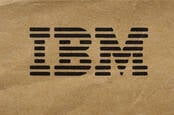 IBM logo printed in black on brown paper