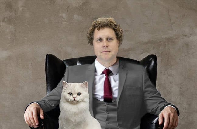 Photoshopped image of Rocket Lab CEO Peter Beck with white cat