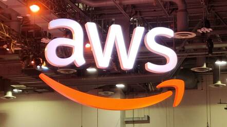 The AWS logo hangs over the Re:invent Expo