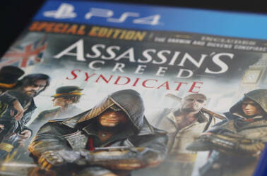 Assassin's Creed Syndicate game in its box for the PlayStation 4