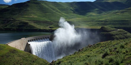 Mist rising above the Katse dam wall in Lesotho, Southern Africa