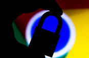 Silhouette of a person holding a padlock in front of the Google Chrome logo