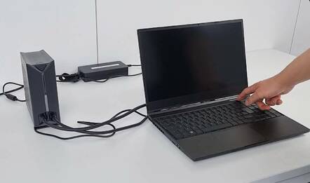 A still from a video showing Tuxedo Computers' liquid-cooled Stellaris 15 laptop.