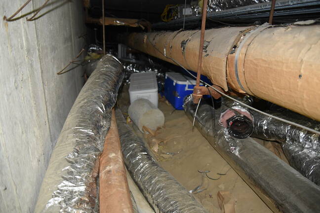 Another view of the crypto mining setup under a Massacusetts school cohasset-mining-crawlspace