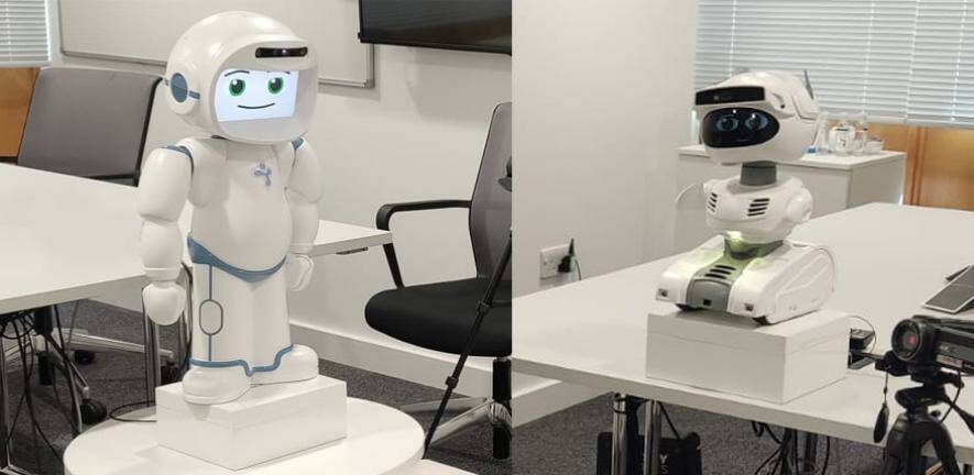 Talking robots designed to interact and help boost employees' moods at work are more effective if they don't look like humanoids, according to a Briti