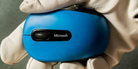 A blue Microsoft mouse
