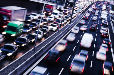 Busy freeway filled with cars bumper to bumper