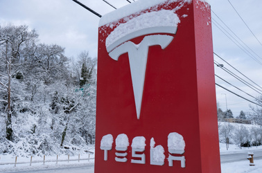 Tesla sign in snow